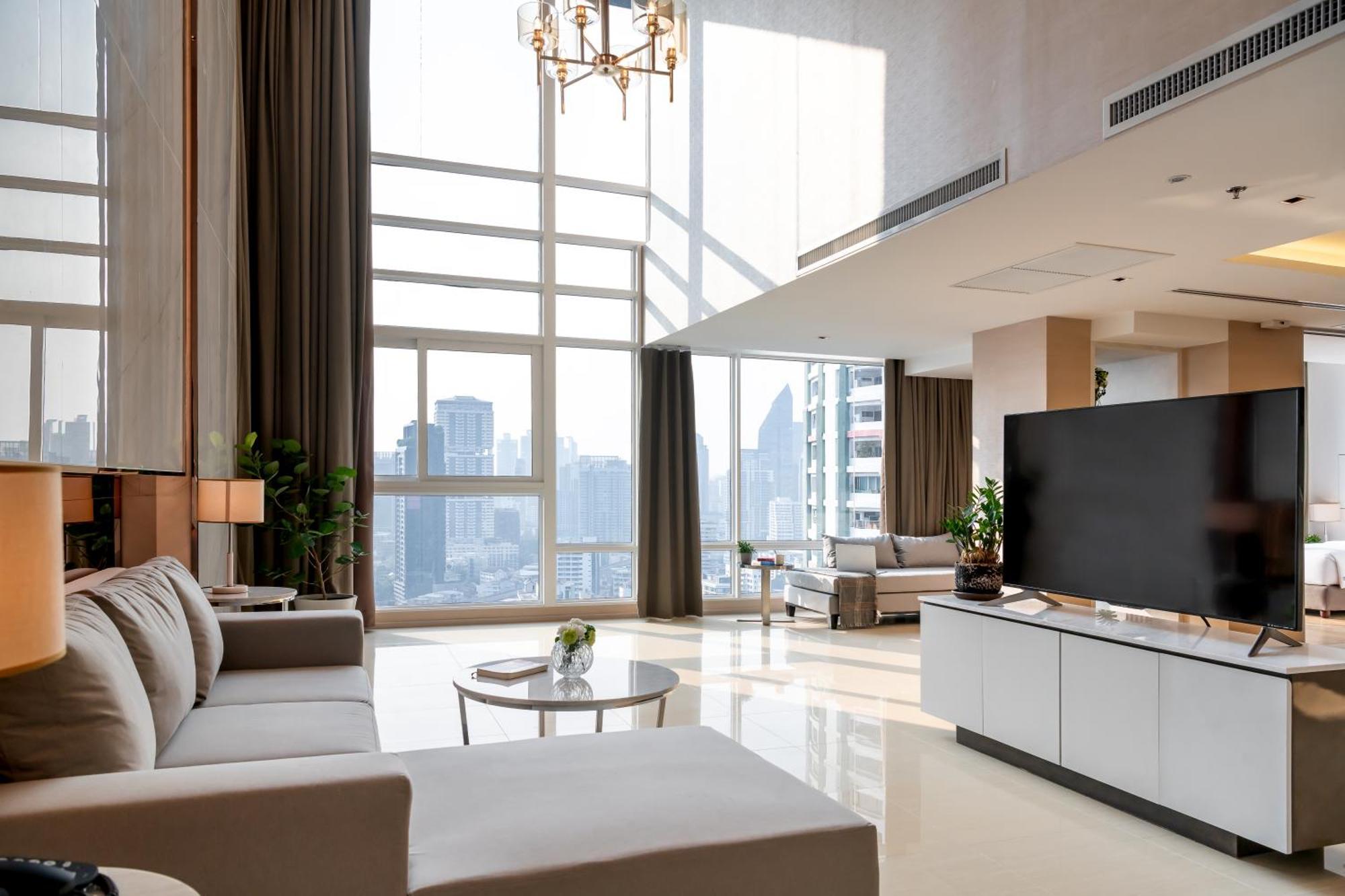 Jasmine 59 Hotel Бангкок Екстер'єр фото A living room in a luxury apartment